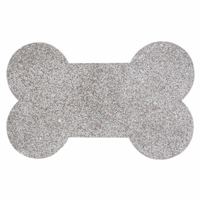 Silver dog bone-shaped placemat with a glittery non-slip surface and rounded ends.