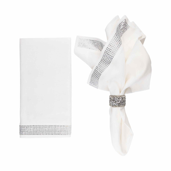 White linen-cotton napkin with a crystal rhinestone band and a folded napkin secured with a rhinestone ring.
