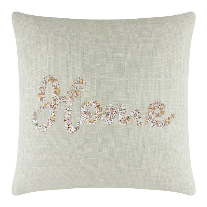 Light green linen pillow with seashell "Home" design in beige white and light brown embellishments.