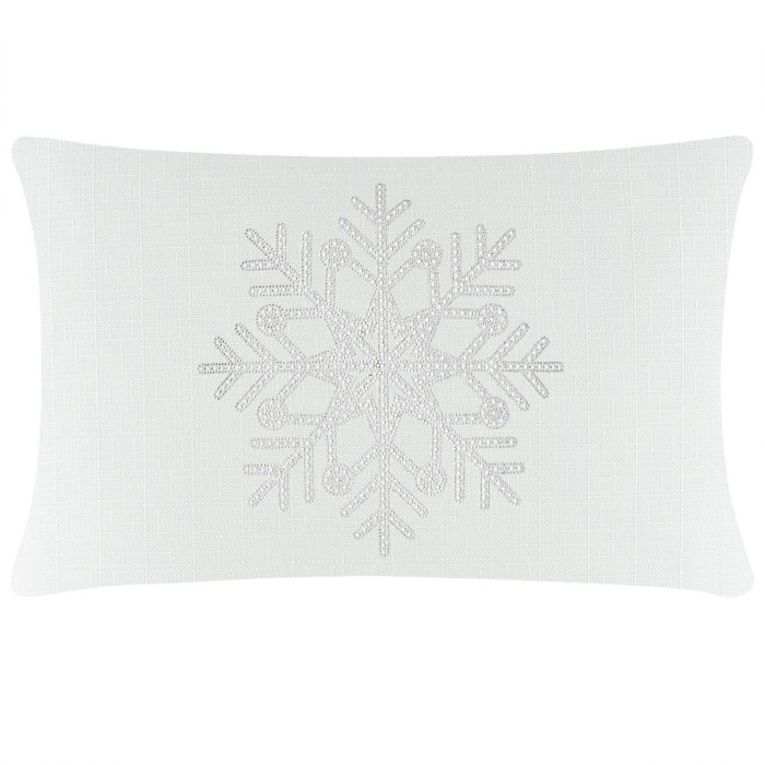 White rectangular pillow featuring a textured fabric with a rhinestone snowflake design in the center.