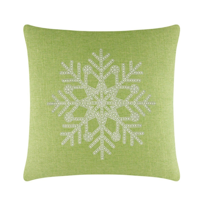 Lime green square pillow featuring a rhinestone snowflake design with intricate detailing and a textured fabric surface.