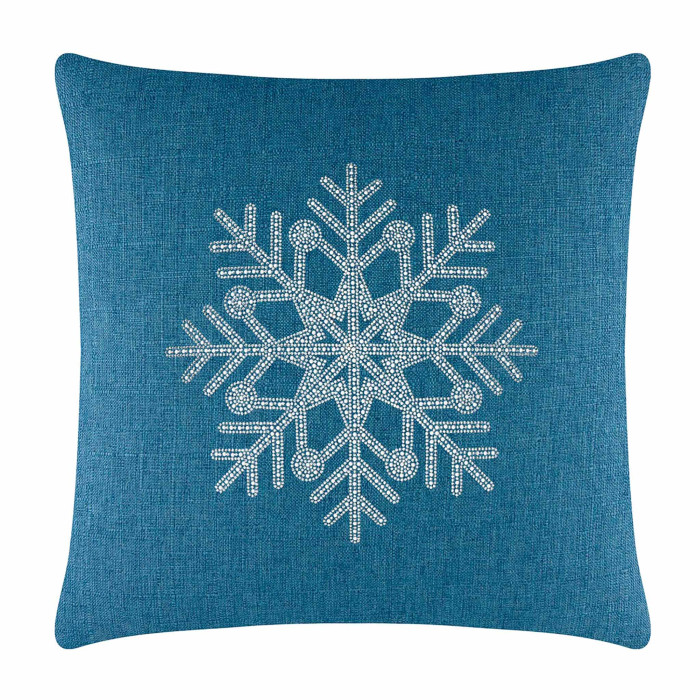 Square teal pillow with a textured fabric featuring a rhinestone snowflake design in the center.