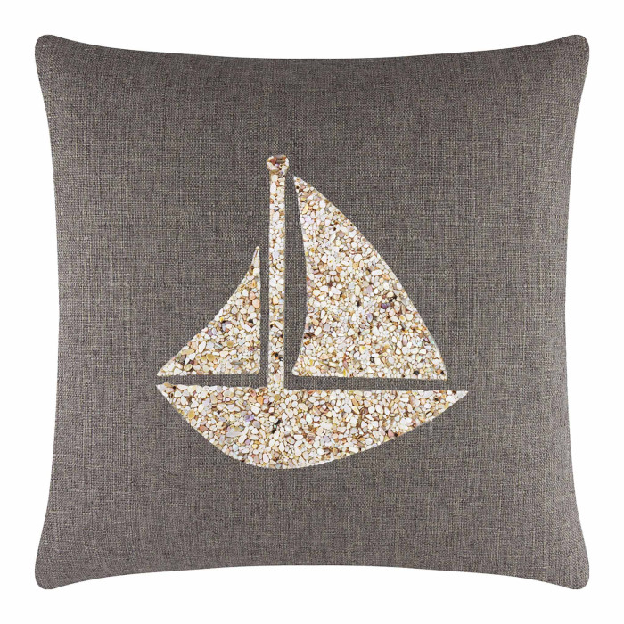 Square pillow with a dark gray textured fabric featuring a seashell sailboat design in beige and cream tones.