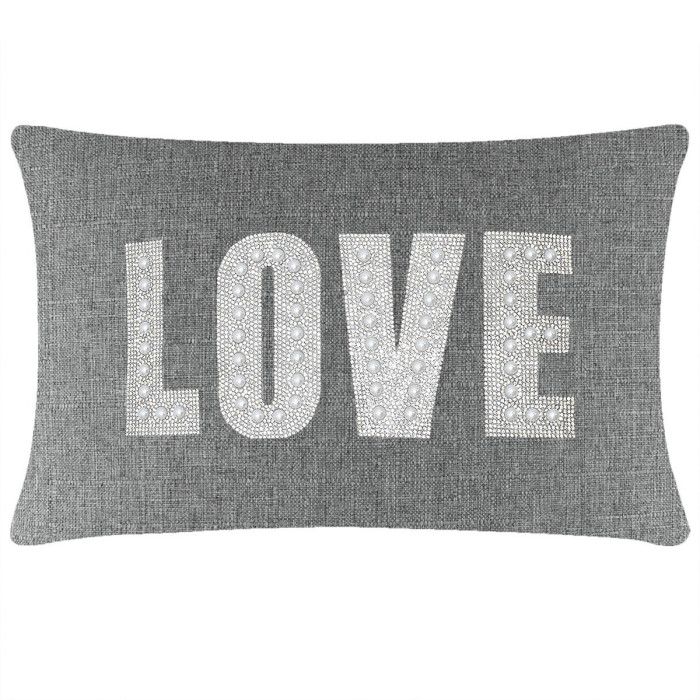 Gray woven pillow with "LOVE" in rhinestones and faux pearls featuring a plush rectangular shape and piped edges.