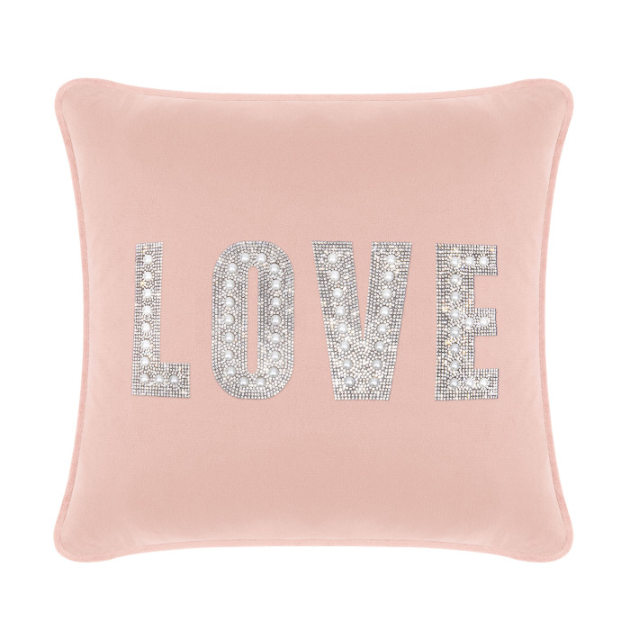 Blush velvet pillow featuring the word "LOVE" in rhinestones and faux pearls square shape with piped edges.