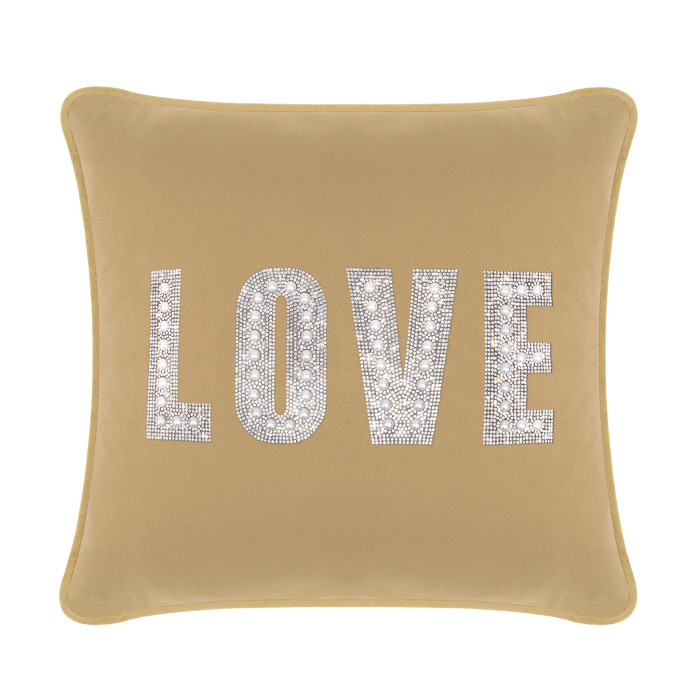 Champagne velvet pillow with rhinestone and faux pearl embellishments spelling "LOVE" in large letters.