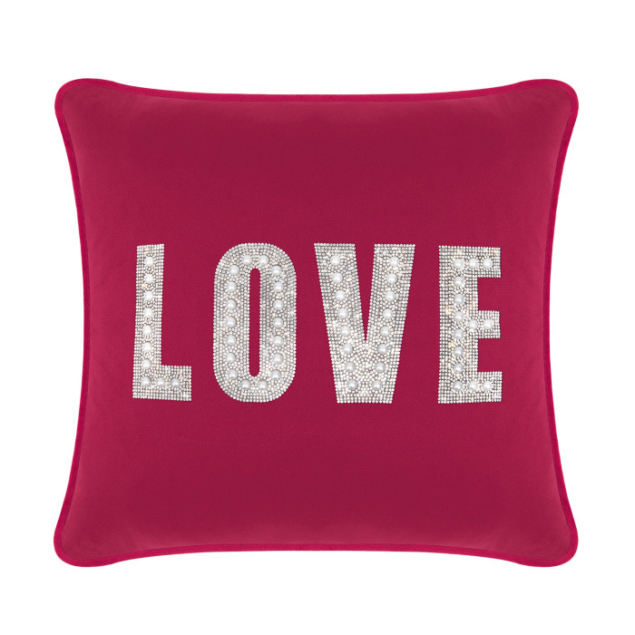 Square fuchsia velvet pillow with "LOVE" in rhinestones and faux pearls featuring a smooth velvet texture and contrasting trim.