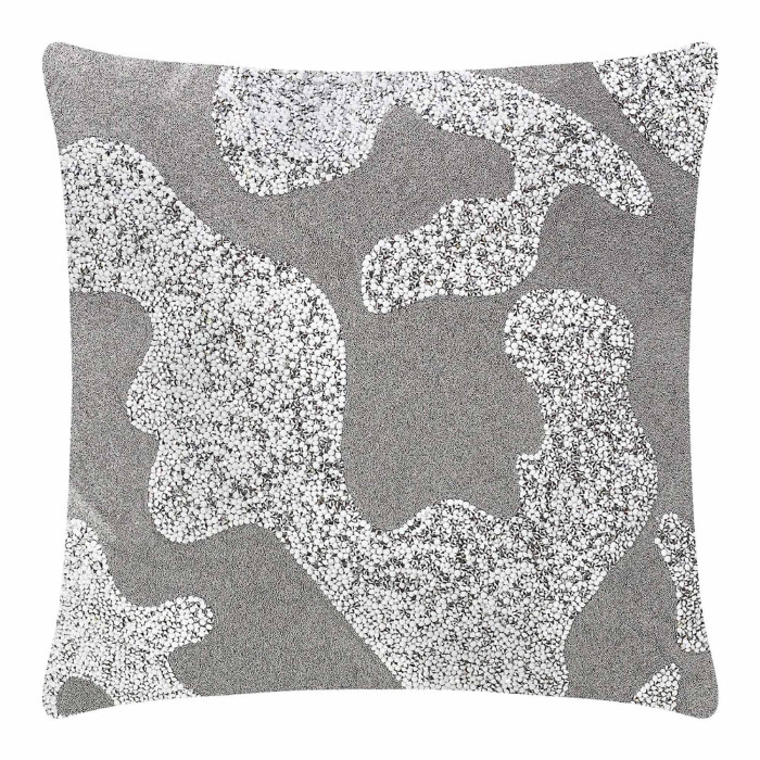 Square pillow with a textured gray background and abstract white patterns resembling stones or beads.