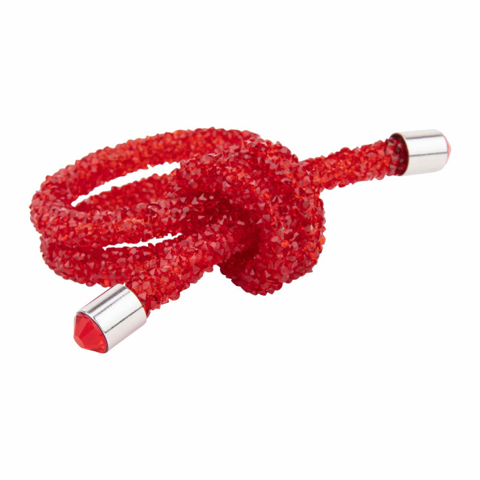 Red sparkling wire napkin ring in a knot shape with rhinestone embellishments and silver metal ends.