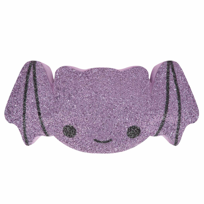 Bat-shaped pillow in shimmering lavender with glittery texture black facial features and pink edges.