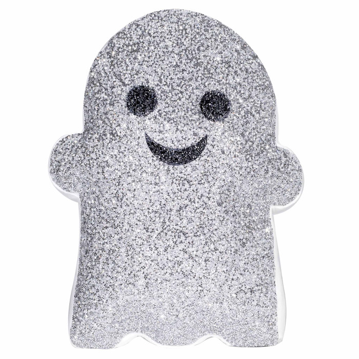 Silver glitter ghost-shaped pillow with black eyes and a smiling mouth featuring a plush texture and a white border.