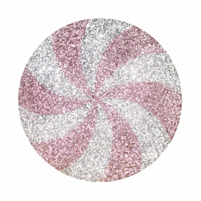 Round pink and silver peppermint-shaped pillow with a rhinestone swirl and soft velvet texture.