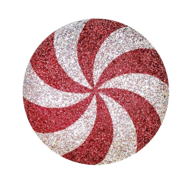 Round pillow with red and white spiral design featuring a glittery texture and a soft velvet back.
