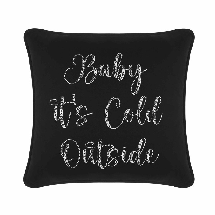 Black velvet pillow featuring glass rhinestones spelling "Baby it's Cold Outside" in a cursive font with a square shape.