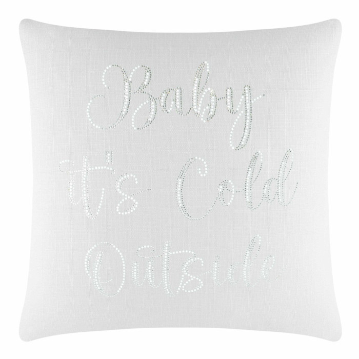 White square pillow with textured fabric and glass rhinestones spelling "Baby it's Cold Outside" in a cursive font.