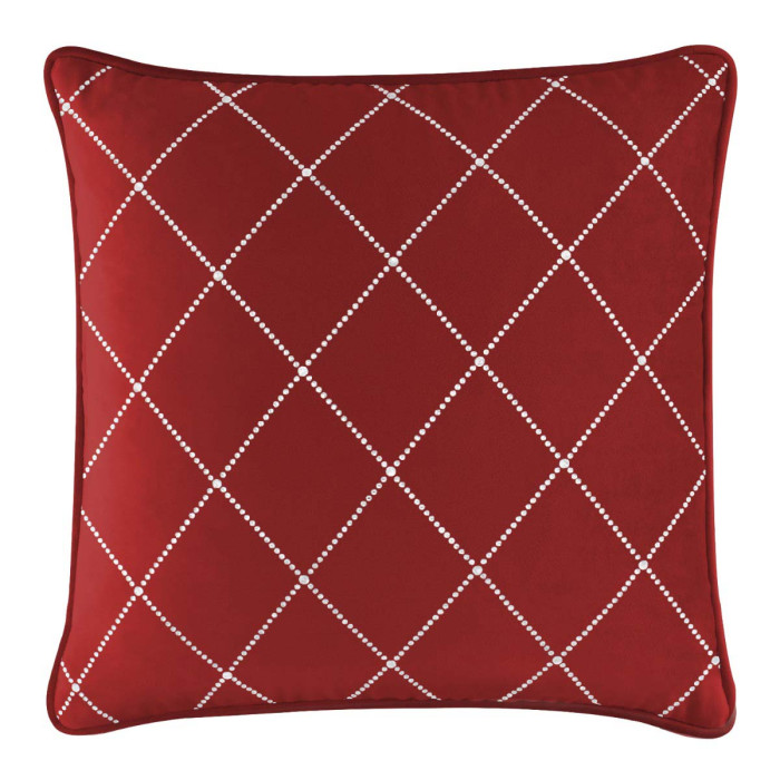 Red square pillow with white rhinestone diamond pattern and a smooth texture.