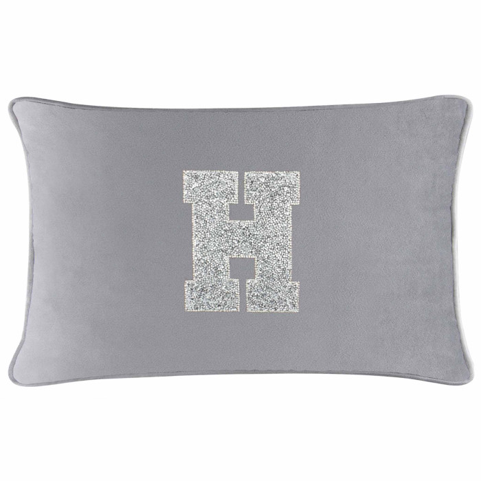 Silver velvet pillow with a glittering rhinestone letter "H" in the center rectangular shape soft texture.
