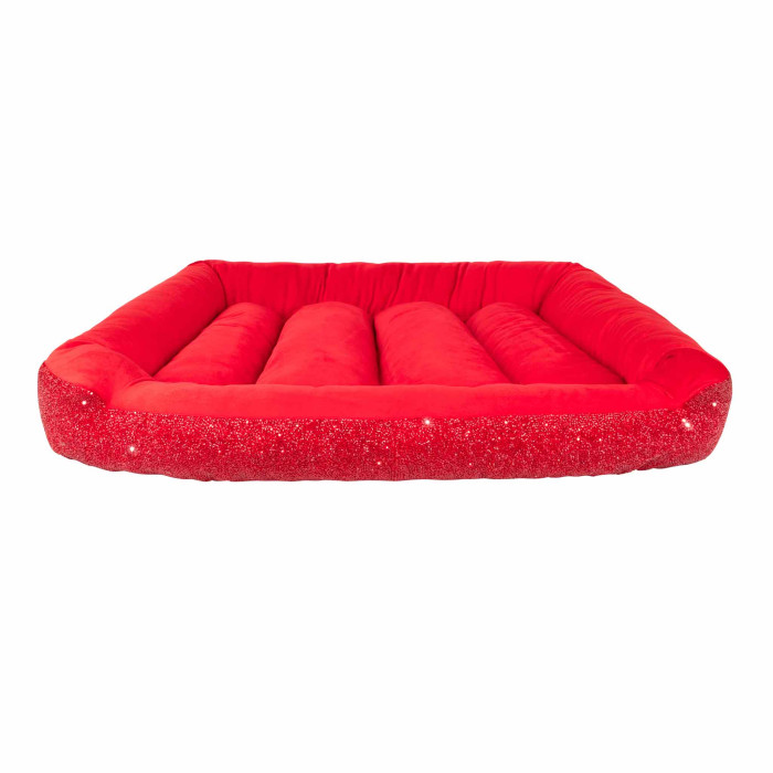 Red square pet bed with a plush velvet interior and a sparkling rhinestone-trimmed exterior featuring a soft cushioned base.
