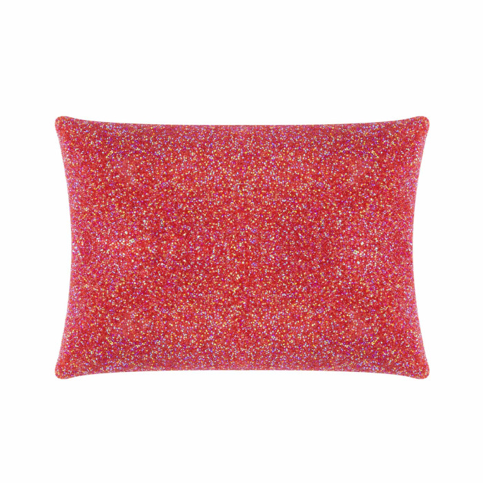 Red iridescent pillow with a textured surface fully adorned in rhinestones featuring a rectangular shape and soft edges.