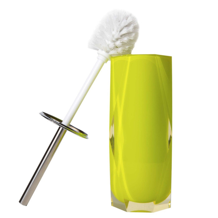 Faceted yellow resin holder with a glossy finish paired with a white brush and silver metal base.