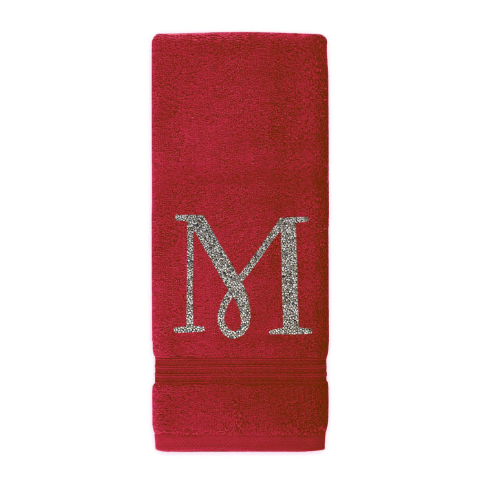 Red plush cotton terry hand towel with a sparkling rhinestone monogram "M" and a decorative trim at the bottom.