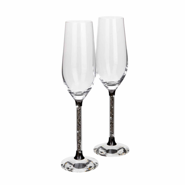 Clear crystal toasting flute with a black base and a glittering silver-filled stem measures 10"x3"x3".