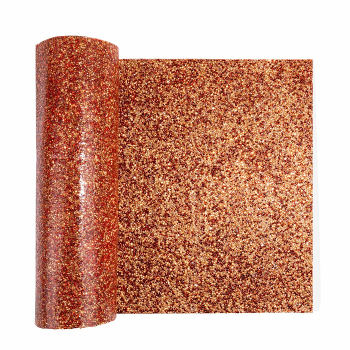 Copper table runner with a textured glittery surface featuring wavy edges and a sparkling finish throughout.