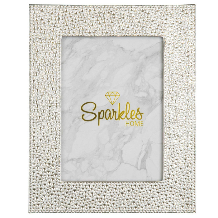 Silver picture frame adorned with glass rhinestones featuring a marble-patterned background and a gold logo.