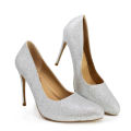 Gold glitter high heels with a pointed toe 3-inch stiletto heel and a smooth beige interior.