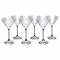 Iridescent glass martini glass with a crystal-filled stem and a faceted clear base. Iridescent glass martini glass with a crystal-filled stem and a faceted clear base.