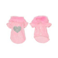 Red velvet pet cardigan with a faux fur collar and silver rhinestone paw print embellishment featuring snap closure.