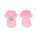 Red velvet pet cardigan with a faux fur collar and silver rhinestone paw print embellishment featuring snap closure. Red velvet pet cardigan with a faux fur collar and silver rhinestone paw print embellishment featuring snap closure.