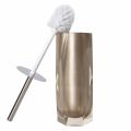 Faceted resin toilet brush holder in metallic silver with a diamond-like texture and a stainless steel handle. Faceted resin toilet brush holder in metallic silver with a diamond-like texture and a stainless steel handle.