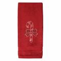 Red cotton hand towel featuring a rhinestone candy cane motif with a bow textured surface measures 30"x16".
