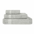 Three stacked towels in black and white featuring rhinestone embellishments on the stripes made of cotton with a plush texture. Three stacked towels in black and white featuring rhinestone embellishments on the stripes made of cotton with a plush texture.