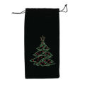 Red velvet wine bag with a rhinestone Christmas tree design and an orange drawstring closure. Red velvet wine bag with a rhinestone Christmas tree design and an orange drawstring closure.