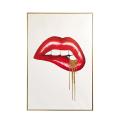Red lips with white teeth gold dripping embellishments set against a white background and framed in gold. Red lips with white teeth gold dripping embellishments set against a white background and framed in gold.