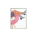 A pair of silver rhinestone ankle boots on a canvas with a metallic gold frame and a pink fluffy chair in the background. A pair of silver rhinestone ankle boots on a canvas with a metallic gold frame and a pink fluffy chair in the background.