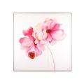 Two pink flowers with dark centers on a white background framed in metallic with partial hand painting and rhinestone accents.