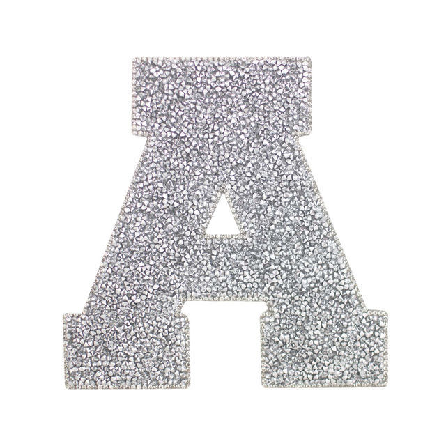Large silver block letter "A" with a textured glittery surface and a triangular cutout in the center.