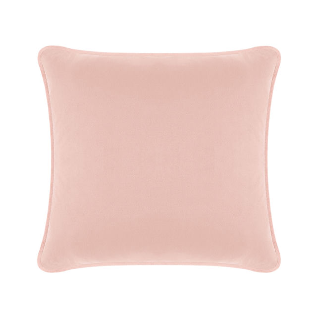Blush pink velvet square pillow with a smooth texture and rounded edges.