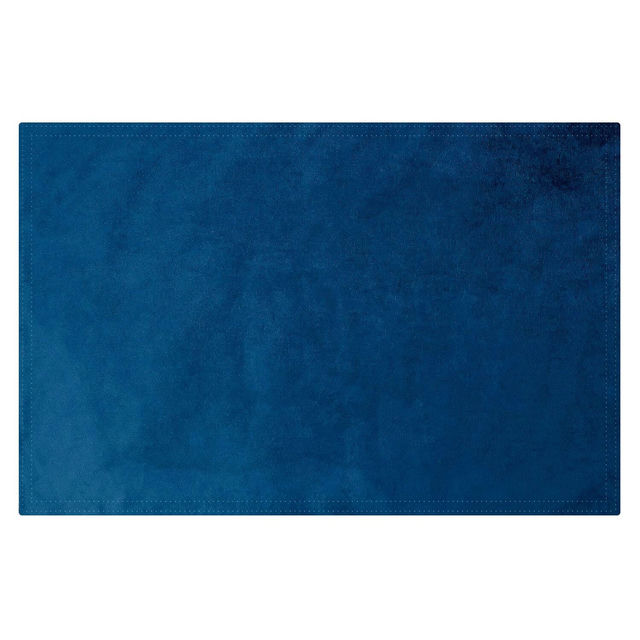 Dark blue rectangular placemat made of soft fabric with a smooth texture and stitched edges.