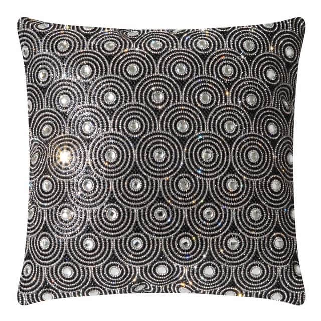Black velvet pillow with circular glass rhinestone embellishments in an orbital pattern featuring a textured surface and plush shape. Black velvet pillow with circular glass rhinestone embellishments in an orbital pattern featuring a textured surface and plush shape.
