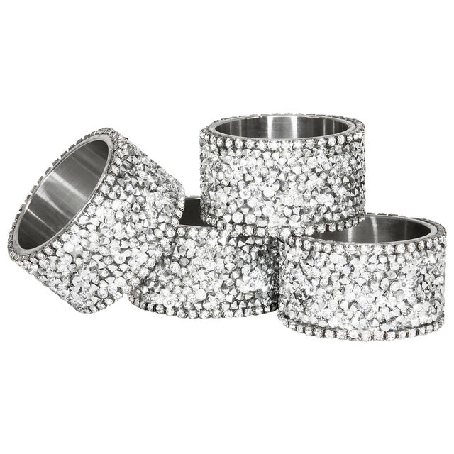 Set of 4 stainless steel napkin rings adorned with multifaceted clear rhinestones featuring a smooth metallic interior.
