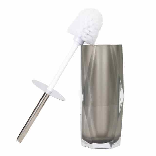Faceted resin toilet brush holder in metallic silver with a diamond-like texture and a stainless steel handle.