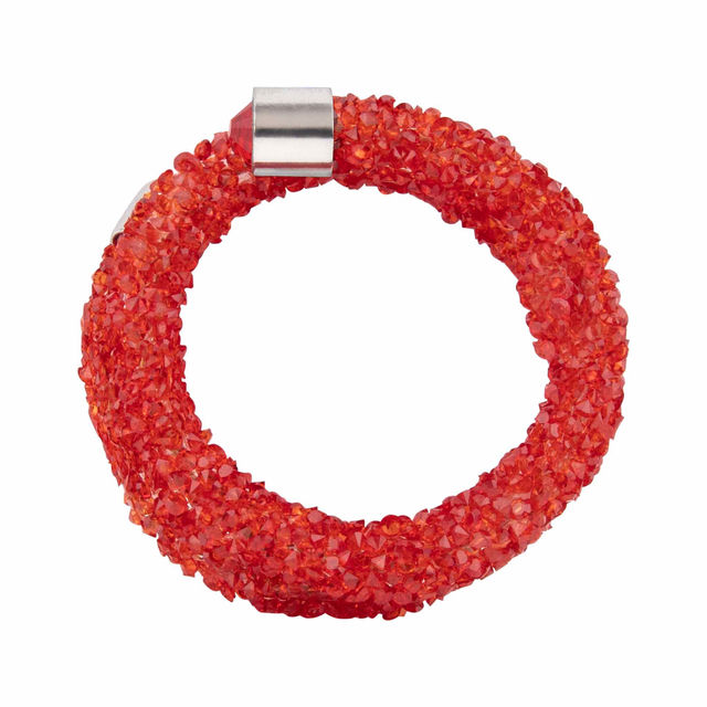 Red crystal napkin ring with a flexible wire base featuring sparkling stones and silver metal end caps.