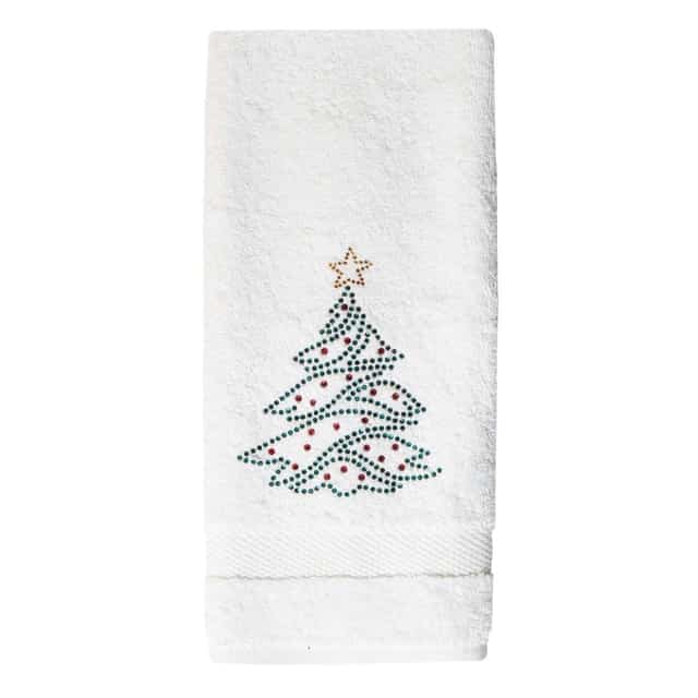 White terry cotton hand towel featuring a green rhinestone Christmas tree design with red ornaments and a gold star on top.