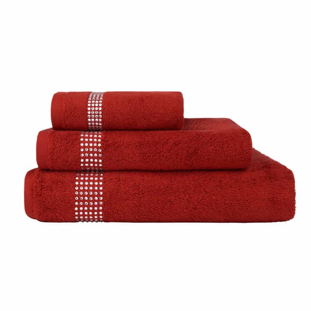 Three stacked towels in black and white featuring rhinestone embellishments on the stripes made of cotton with a plush texture.