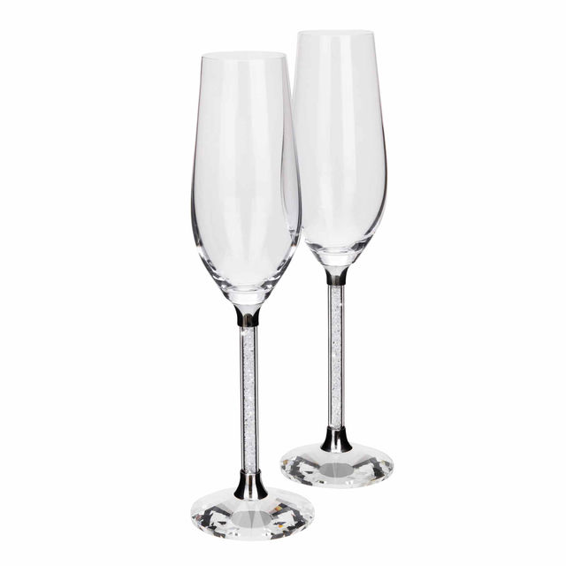 Clear crystal toasting flute with a textured silver stem and a round faceted base measures 10 inches tall and 3 inches wide.