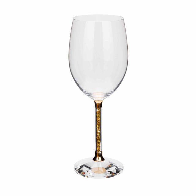 Clear crystal wine glass with a gold stem featuring yellow rhinestones and a faceted clear base.